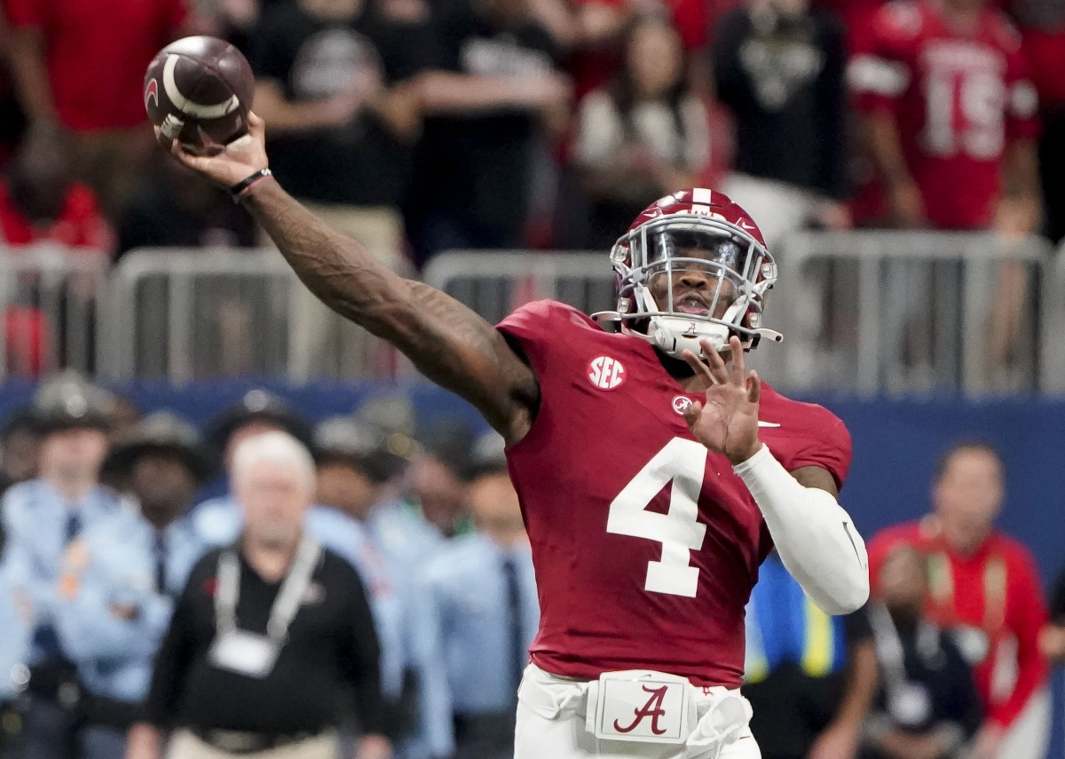 Dec 2, 2023; Atlanta, GA, USA; Alabama Crimson Tide quarterback Jalen Milroe (4) throws against Georgia at Mercedes-Benz Stadium. Milroe was named the MVP. Alabama defeated Georgia 27-24 to claim the SEC Championship. Mandatory Credit: Gary Cosby Jr.-USA TODAY Sports